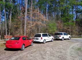 Vehicles at the Highway 7 Trailhead parking area.