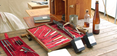 Photo of 19th century medical instruments during park special event.