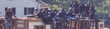 Photo of 7th Pennsylvania troops on canal boat during park special event.
