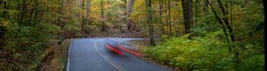 a car on the scenic drive in fall