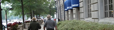 Two park rangers walking back to the White House Visitor Center. (NPS Photo by J. Feeney)