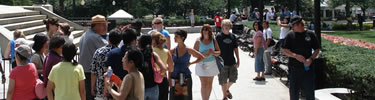 A park ranger talking to a group of visitors. (NPS Photo by J. Feeney)