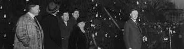 President Coolidge lighting the National Christmas Tree. (Library of Congress Prints & Photographs Division)