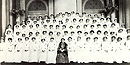 Clara Barton seated with a female nurses graduation class. Clara Barton seated with a female nurses graduation class.