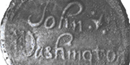 fancy calligraphy signature of John Washington on greyish wine bottle