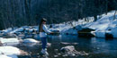 Young girl flyfishing on Big Hunting Creek in the winter. Young girl flyfishing on Big Hunting Creek in the winter.