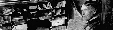 Clara Barton facing her desk.