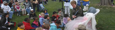 NPS Director Bomar reading to children attending the White House Easter Egg Roll.