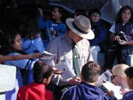 Junior Rangers on a scavenger hunt with a Park Ranger