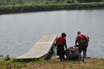 "Ranger Chuck" assisting park stewards with a canoe.