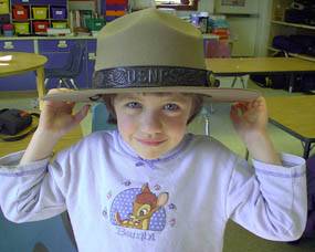 Child in NPS hat