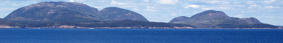 Granite mountains on islands along coast