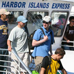 Visitors disembark the park ferry.