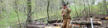 log hewing demonstration