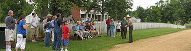 A ranger program along the Stage Road with the McLean House in the background.