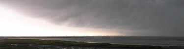 Afternoon summer storms are common on Assateague. 23kb