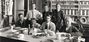 Edison and his staff working late into the night stop for supper.
