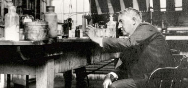 Thomas Edison working in his chemistry laboratory.