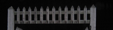 grey circular points loom over you. the fence hinders you at all hours of the night.