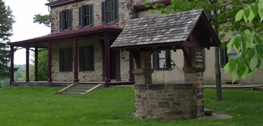 The well and Stone House were added to Friendship Hill in the 1825
