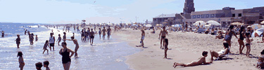 Bathers by the historic Riis Park Bathhouse.