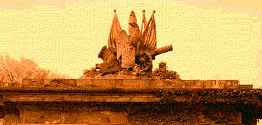 The Fort Jay eagle sculpture with its flags and cannons, may be the symbol for the New York Artillery.