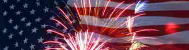 Photo of American flag and fireworks