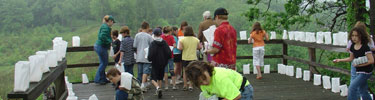 School students helping at memorial program