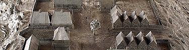 Bronze model of the settlement at Saint Croix Island shows several buildings.