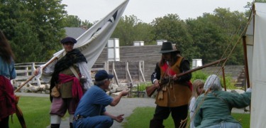 Costumed interpreters are demonstrating the military dress of Scottish soldiers of 1650