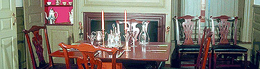 The dining room of the Derby House showcases elegant 18th century furniture and silver.