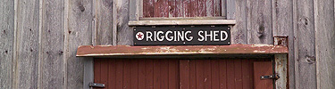 The carved sign for the rigging shed, where work is done for the tall ship Friendship
