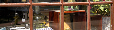 the front window of the West India Goods Store