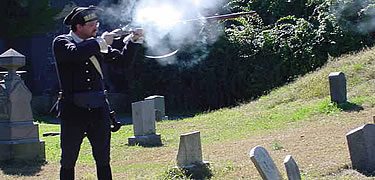 See an artillery demonstration in the historic cemetery of St. Paul's Church