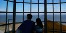 Visitors viewing the Chesapeake Bay from Old Cape Henry Lighthouse, Virginia