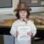 Young visitor proudly displaying her completed Junior Ranger Booklet