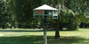 A large birdfeeder on the lawn of Glenmont just outside the conservatory.