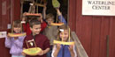 Children making model ships at Essex Shipbuilding Museum
