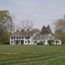 White manor house in early spring.
