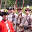 Officer inspecting militia
