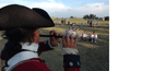 A large black triangular hat is right in your face. A man wearing it holds a flute like intrument, he wears a red coat with white facings.