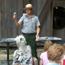 Ranger demonstrating how to start making a pinch pot