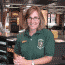 Kathi Levine pauses at the Visitor Center desk to tell her story.