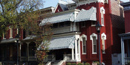 Maggie Walker's home in Richmond with green awnings.