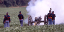 cannon firing on the battlefield
