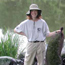 Student Intern next to the Mill Pond