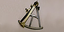 The octant is a navigational tool based on the curve of one eighth of a circle. It measures angles for solar and celestial navigation.
