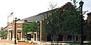 The Regional Visitor Center in Salem is a brick building with a high peaked roof.