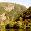 The Delaware River flows through a mountain at the Delaware Water Gap