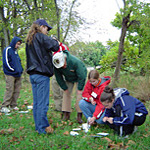 Students investigating micro invertebrates in Eisenhower Run